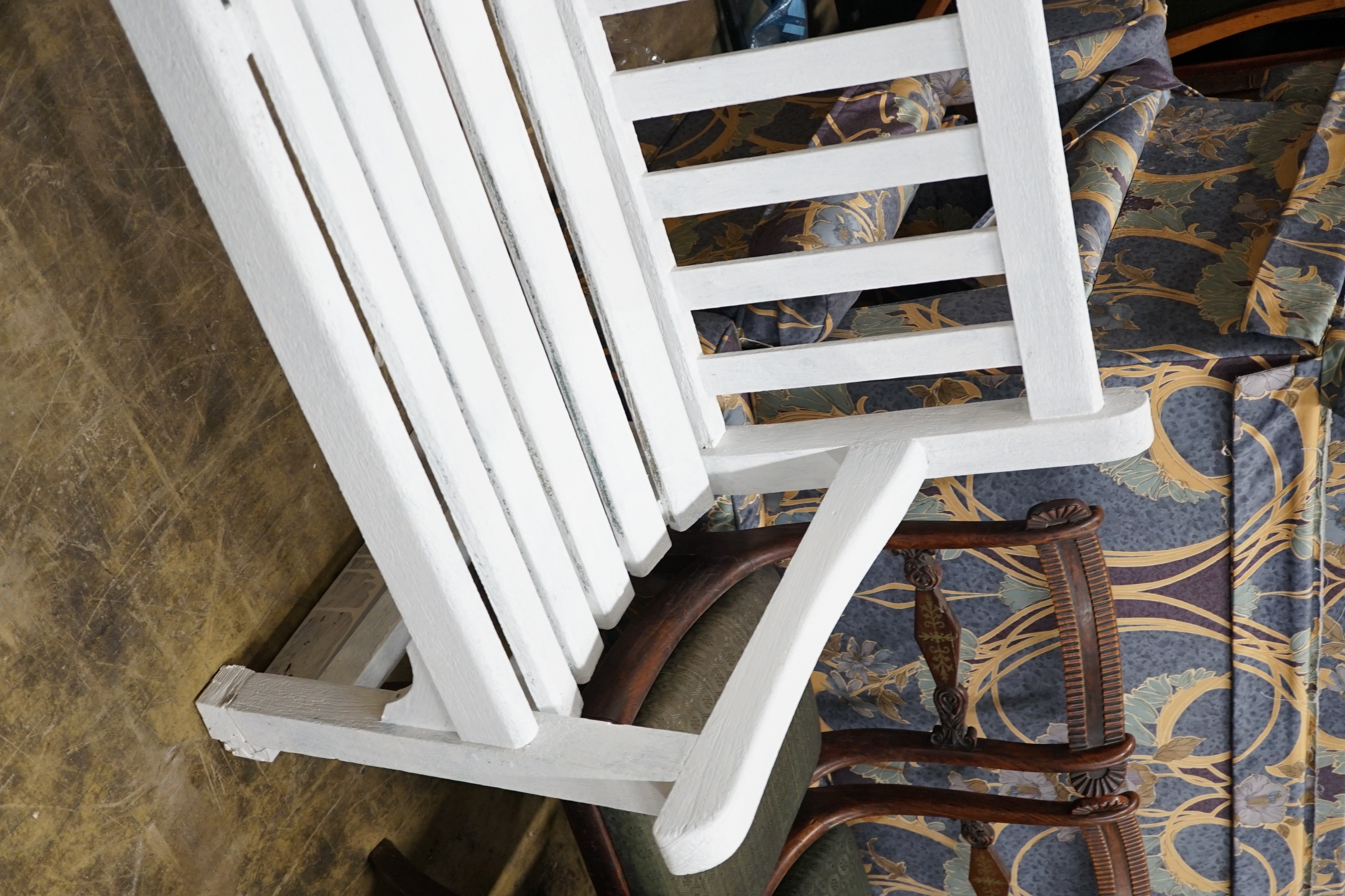 A white painted hardwood garden bench, length 155cm